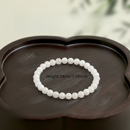 A White Crystal Bracelet，Suitable for Spring Festival，Symbolic Balance and Harmony，Wish Come True，Health and Vitality，Wisdom and Clear Thinking，Love and Happiness，Suitable for the Weak、Night Owl、Office Worker、Student、Intellectuals and the Elderly。